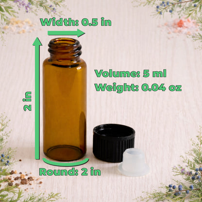 Amber glass bottle shown on a light wooden surface with the cap and stopper beside it, surrounded by subtle floral elements. Green measurement labels indicate width 0.5 inches at the top, height 2 inches along the side, and round base 2 inches, with text showing volume 5 ml and weight 0.04 oz, clearly presenting the size and specifications of the Bay Oil bottle.